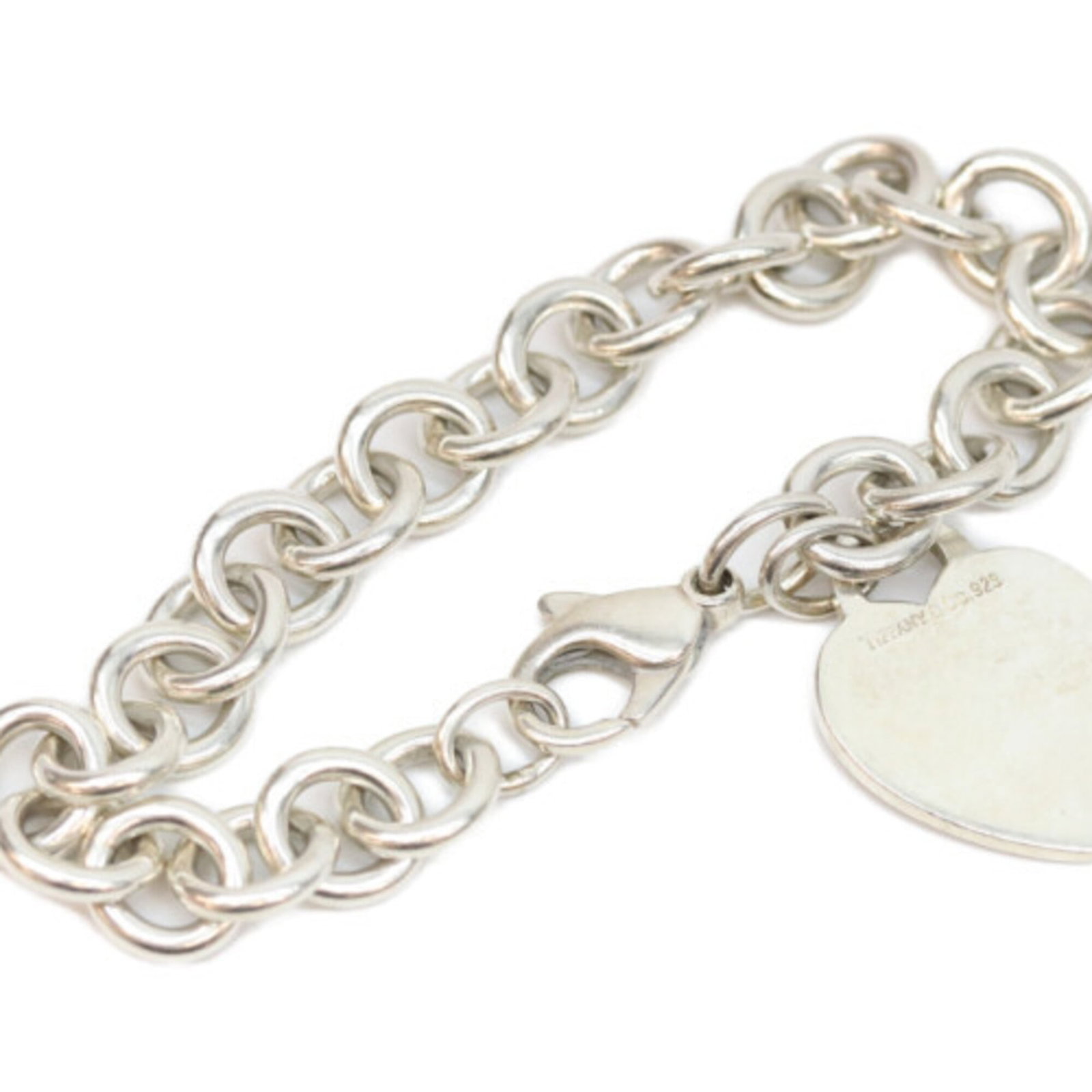 Tiffany Charm Bracelet Silver 925: Tiffany Charm Bracelet Silver 925 Silver 925 Tiffany Charm Bracelet, 12cm in length, features the iconic Tiffany brand. This charm bracelet showcases the luxurious material and sleek design that has b