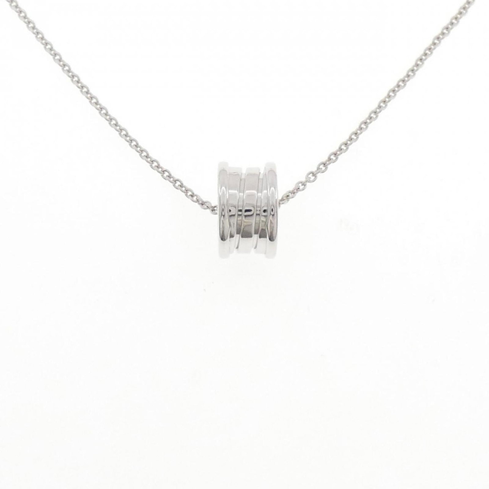 Bvlgari B.Zero1 Necklace: Bvlgari B.Zero1 Necklace Bvlgari's B.Zero1 Necklace boasts sleek, modern design with a pendant featuring the iconic B.Zero1 motif. Crafted from white gold (18K), this necklace showcases a striking 14.