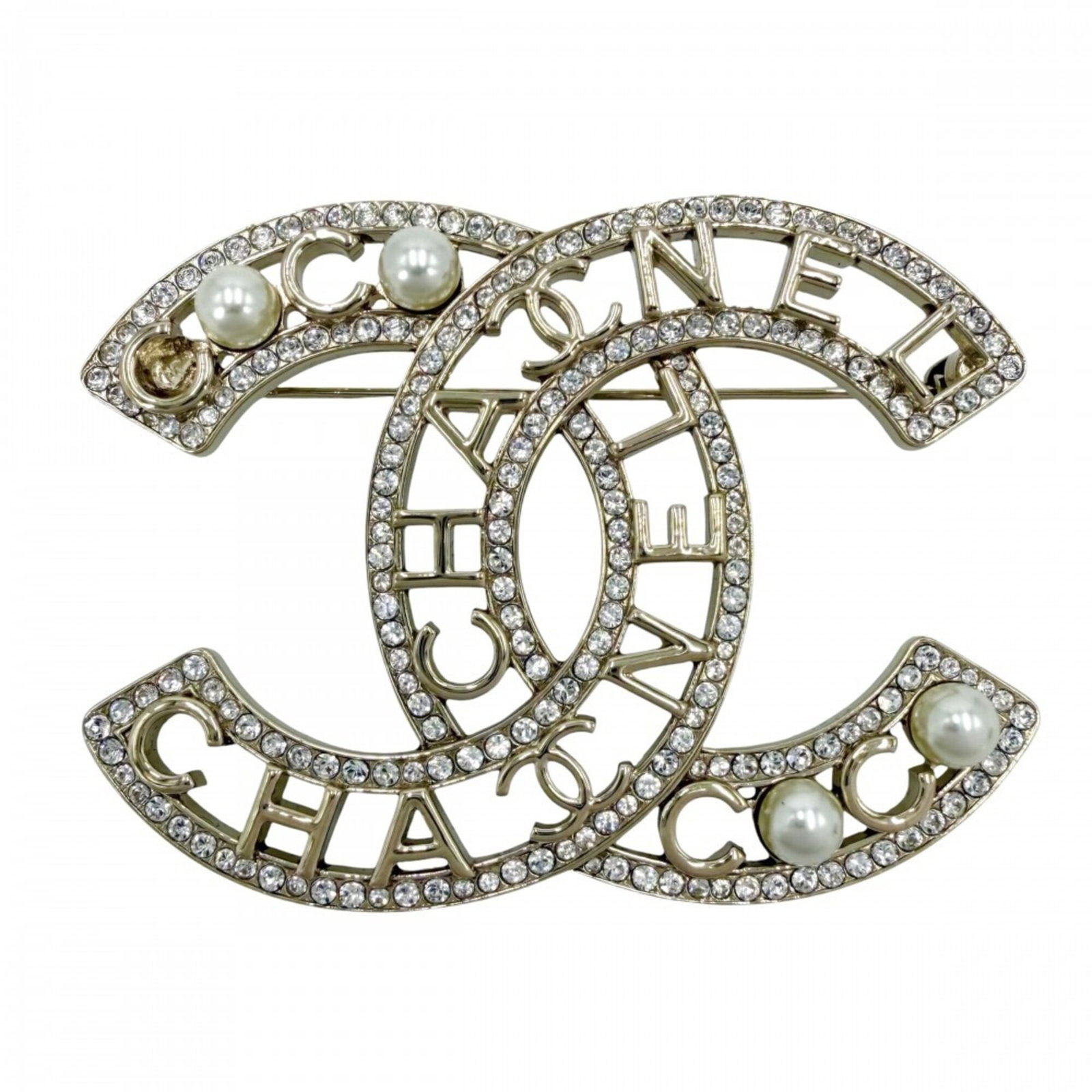 Pearl Rhinestone Gold Artificial Brooch Chanel: Pearl Rhinestone Gold Artificial Brooch Chanel The Pearl Rhinestone Gold Artificial Brooch Chanel boasts an elegant design featuring artificial pearl and rhinestones in gold plating, creating a