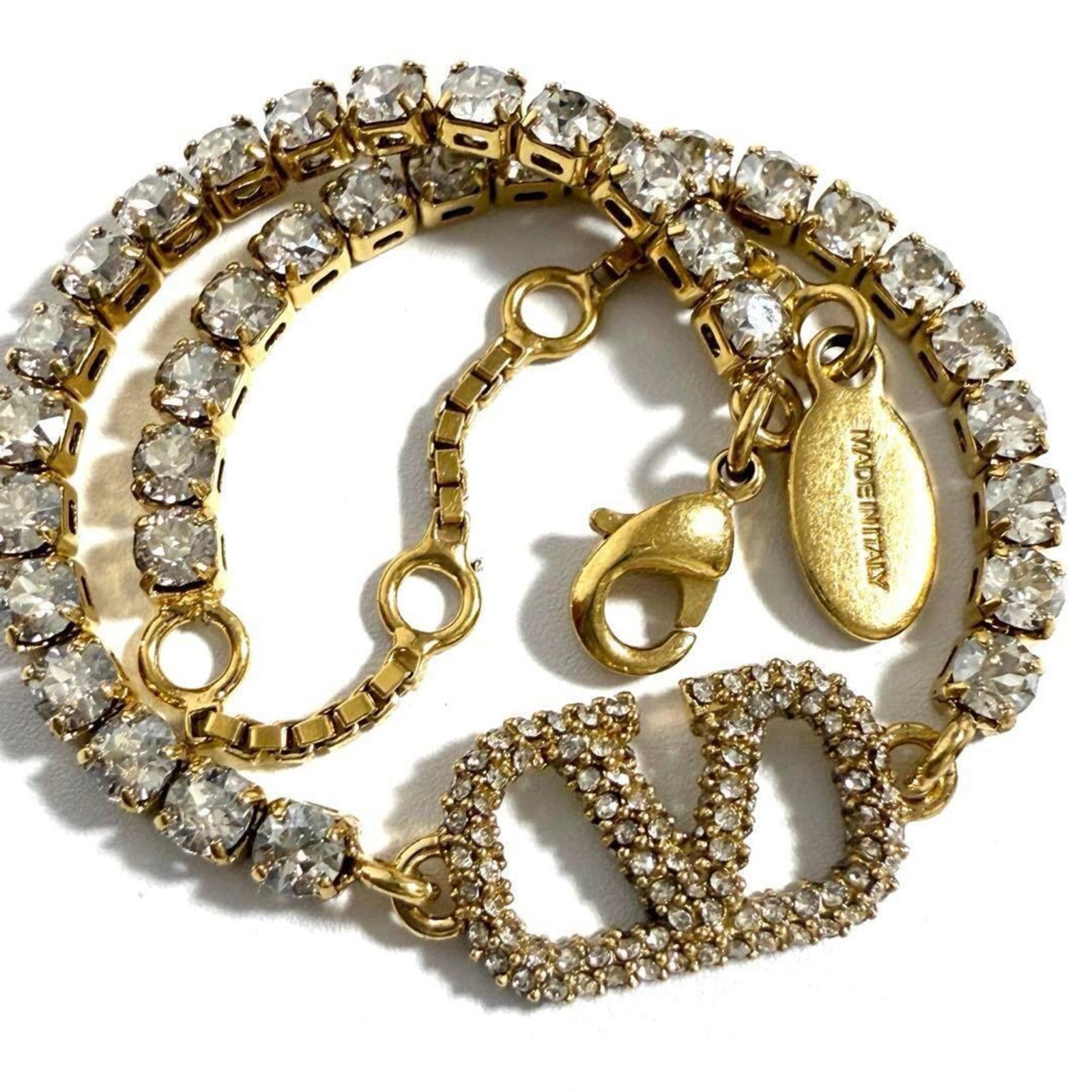 Valentino Charm Bracelet Metal Rhinestone: Valentino Charm Bracelet Metal Rhinestone Metal and rhinestone charm bracelet from Valentino, available in lengths of 16.5cm to 20.5cm. This charm bracelet features metal and rhinestone details,