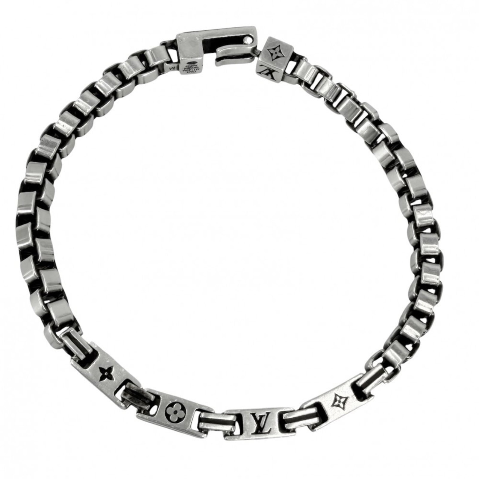 Silver Charm Bracelet by Louis Vuitton: Silver Charm Bracelet by Louis Vuitton Silver Charm Bracelet by Louis Vuitton, featuring a sleek and modern design with a length of 19cm. This charm bracelet is crafted from high-quality silver 925 ma