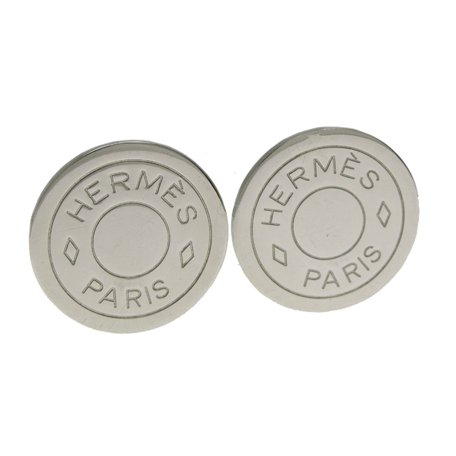 Metal Hermes Earrings Clip: Metal Hermes Earrings Clip Metal Hermes Earrings Clip - A sleek and modern accessory, these metal earrings feature the iconic Hermes logo, showcasing the brand's signature style. Crafted from durable 