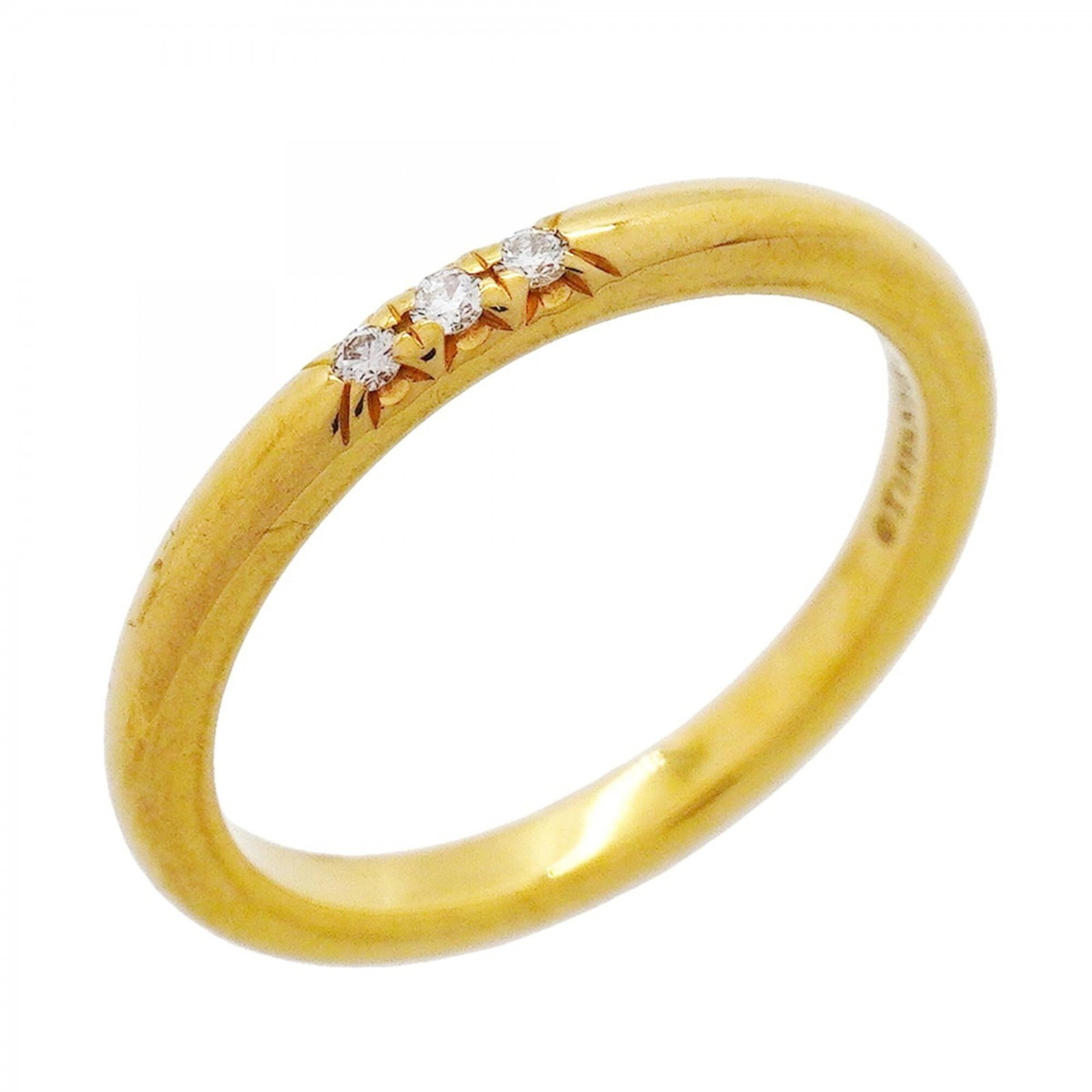 Yellow Gold 18K Tiffany Band Ring: Yellow Gold 18K Tiffany Band Ring Yellow gold 18K Tiffany band ring with a diamond stone, available in US size 3.5. This elegant ring features 18K yellow gold and a diamond set within its band
