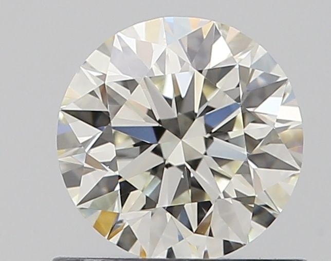 IGI Round 0.7ct I VVS1 - Loose Natural Diamond: IGI Round 0.7ct I VVS1 - Loose Natural Diamond 0.7ct IGI Round Diamond with Exceptional Clarity and Polish, Measuring 5.65L X 5.69W X 3.55H, Certified by IGI. This natural diamond boasts an EX symmetr