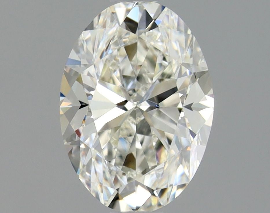 GIA Oval 0.9ct J VVS1 - Loose Natural Diamond: GIA Oval 0.9ct J VVS1 - Loose Natural Diamond GIA Oval Cut diamond with exceptional clarity and color. This 0.9ct natural diamond boasts an impressive VVS1 grade, EX polish, and EX symmetry, making it