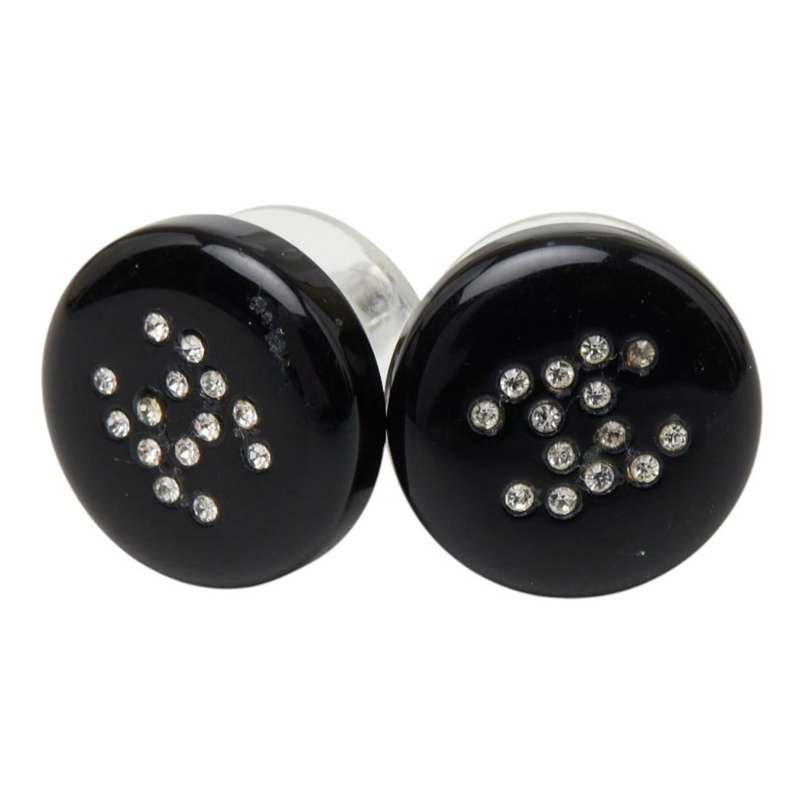 Chanel Stud Earrings Plastic Rhinestone: Chanel Stud Earrings Plastic Rhinestone Chanel's iconic stud earrings feature a sleek black design adorned with plastic rhinestones, adding a touch of glamour to any outfit. The earrings' compact size
