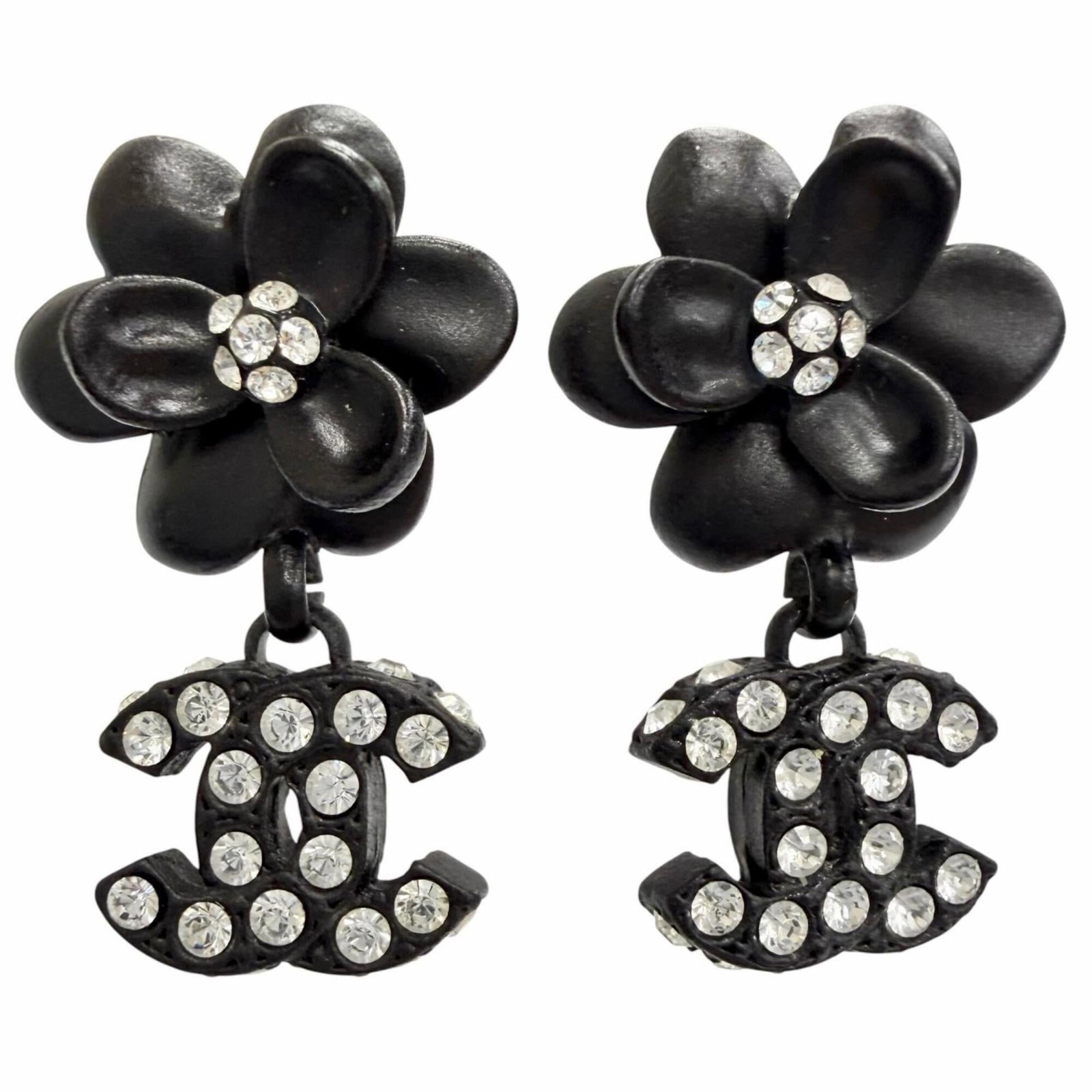 Chanel Stud Earrings Rhinestone: Chanel Stud Earrings Rhinestone Stud earrings from the iconic French fashion brand Chanel, featuring rhinestones in black. Made with high-quality materials, these earrings boast a sleek and sophistica