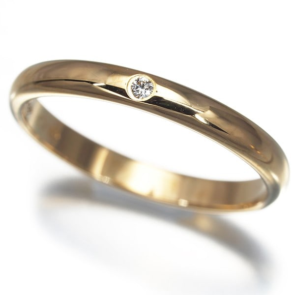 Cartier Ring Diamond 1895 Wedding Band 2.5Mm Eu50 18K 750 Yellow Gold: Cartier Ring Diamond 1895 Wedding Band 2.5Mm Eu50 18K 750 Yellow Gold Cartier's 1895 collection shines in this exquisite yellow gold ring featuring a natural diamond. The 18k metal purity and 2.4mm wi