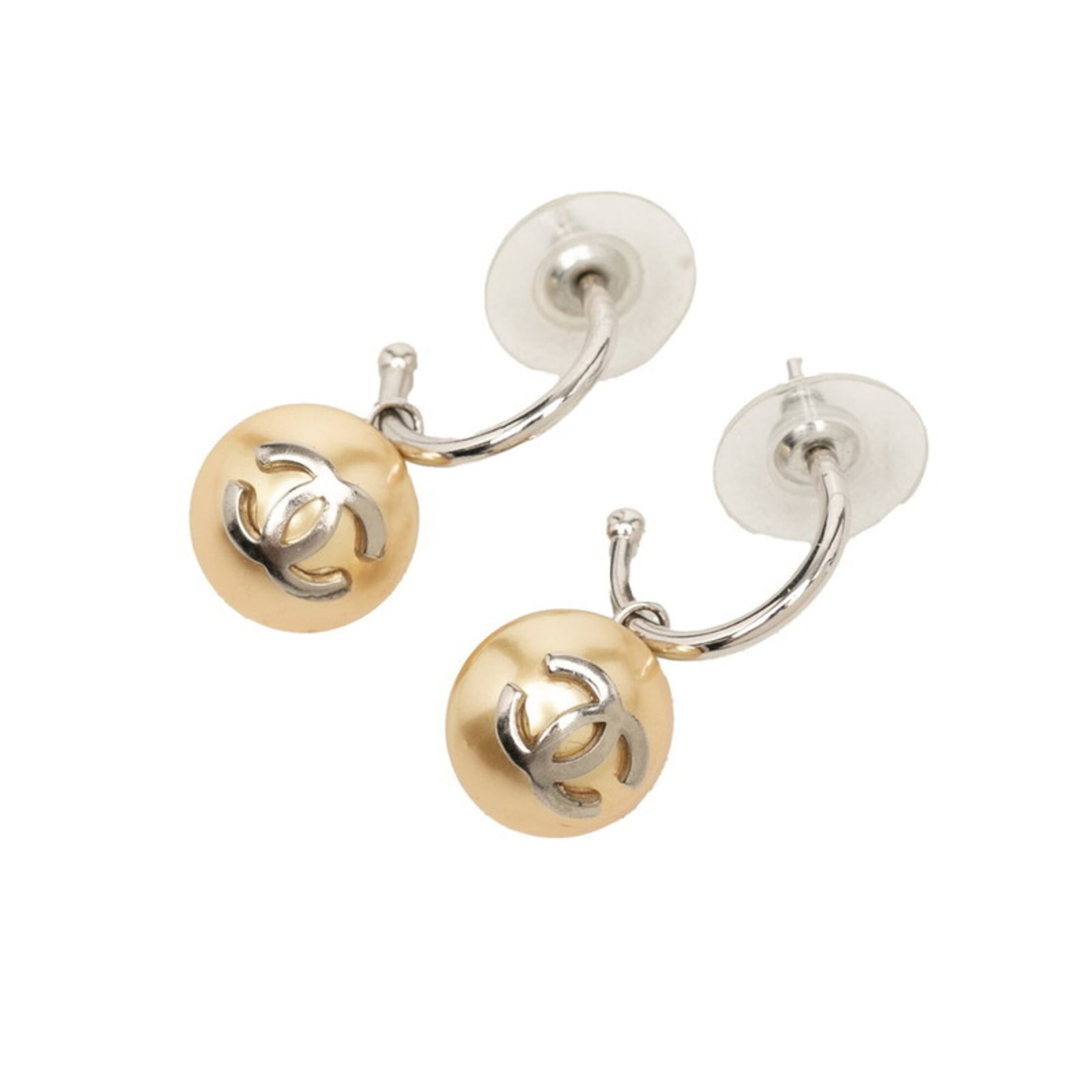Metal earrings by Chanel: Metal earrings by Chanel Metal earrings by Chanel, crafted in gold and silver, boast sleek dimensions of 26.60mm x 12.10mm. The understated design makes these stud earrings a sophisticated accessory f
