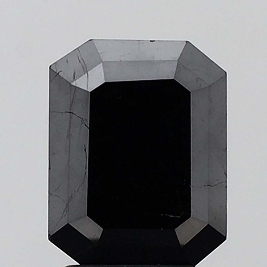 Emerald 2.2ct Fancy Black VVS2 - Loose Natural Diamond: Emerald 2.2ct Fancy Black VVS2 - Loose Natural Diamond 2.2ct Fancy Black VVS2 - A rare and exceptional natural diamond, boasting an EX polish and symmetry, with a mesmerizing Fancy Black color that se
