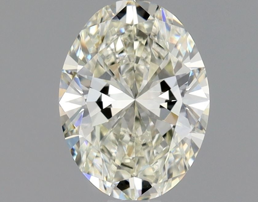 GIA Oval 0.9ct L VVS1 - Loose Natural Diamond: GIA Oval 0.9ct L VVS1 - Loose Natural Diamond GIA Oval 0.9ct L VVS1 - Loose Natural Diamond, certified by the Gemological Institute of America (GIA) with exceptional clarity and luster, showcases a st