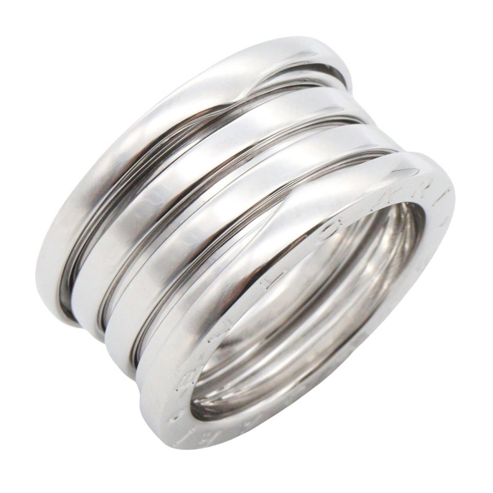 White Gold Bvlgari Ring Band: White Gold Bvlgari Ring Band White gold (18K) details shine in this elegant Bvlgari ring band, crafted from premium materials for a sophisticated look. Available in US size 6, this versatile piece can