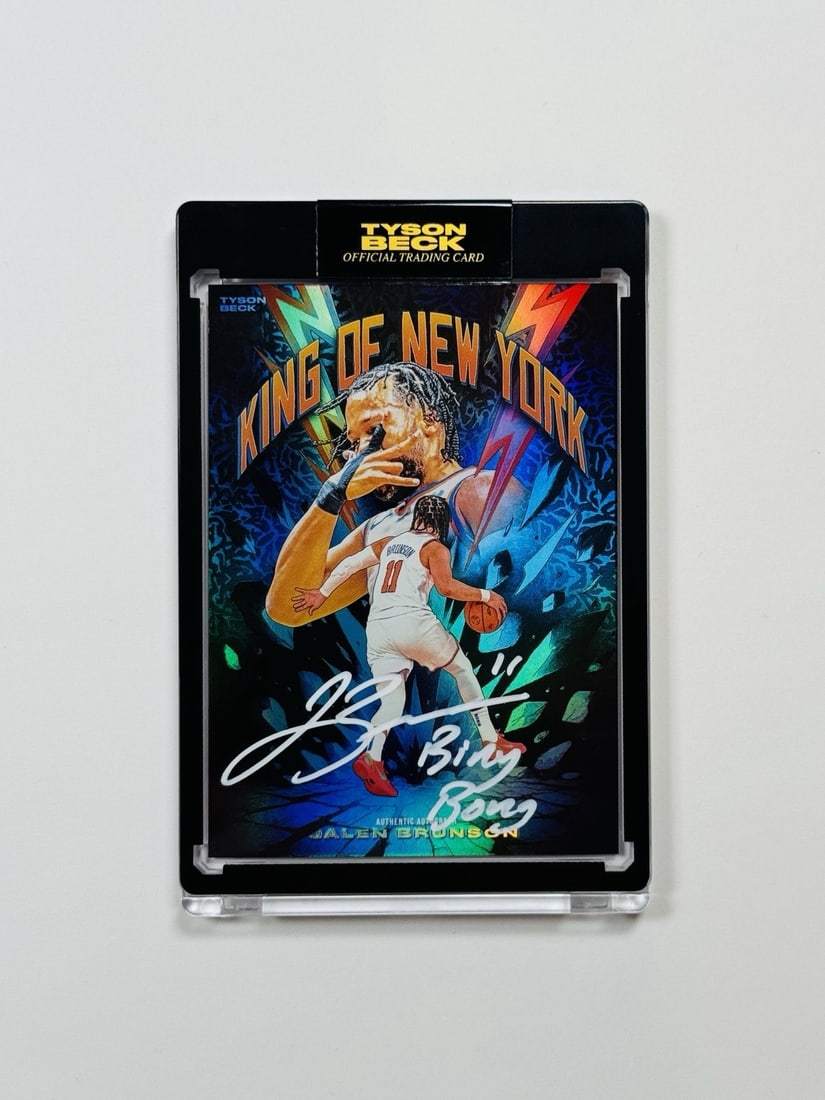 2026 JALEN BRUNSON X TYSON BECK KING OF NEW YORK AUTO BING BONG INCRIPTION/ 3: 2026 JALEN BRUNSON X TYSON BECK KING OF NEW YORK AUTO BING BONG INCRIPTION/ 3 Signed by Jalen Brunson, the 2026 JALEN BRUNSON X TYSON BECK King of New York card features a unique night foil parallel, 