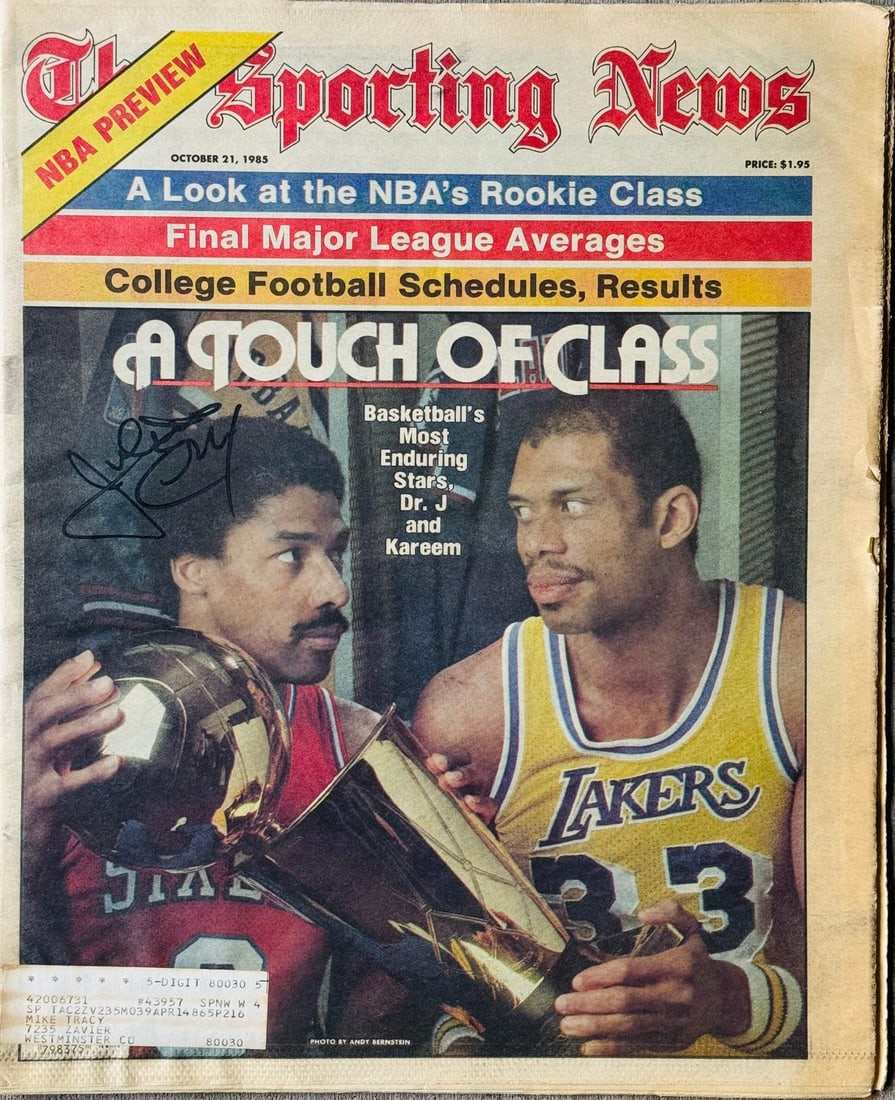 Julius Erving Autographed The Sporting News Newspaper October 21 1985: Julius Erving Autographed The Sporting News Newspaper October 21 1985 Signed by Julius Erving in blue sharpie across the front of The Sporting News Newspaper on October 21, 1985. This unique piece fea