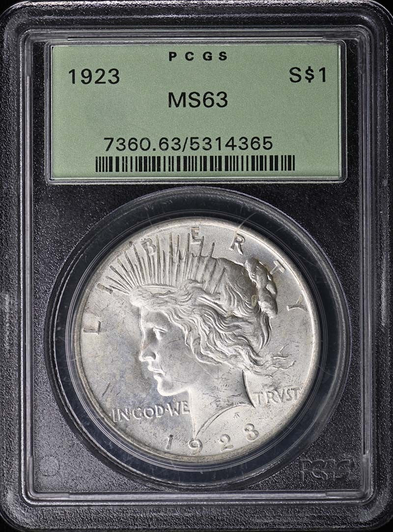 $1 Peace Dollar MS63 PCGS: $1 Peace Dollar MS63 PCGS MS63 PCGS certified 1923 Peace Dollar in uncirculated condition, bearing the mark of the Philadelphia Mint. This coin showcases its grade and certification details, providing