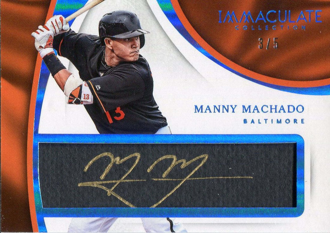Machado Autographed Collection Immaculate Card 2017 Panini: Machado Autographed Collection Immaculate Card 2017 Panini Signed in gold sharpie across the front, this 2017 Panini Immaculate Collection card features an autograph from Manny Machado. Authenticity i