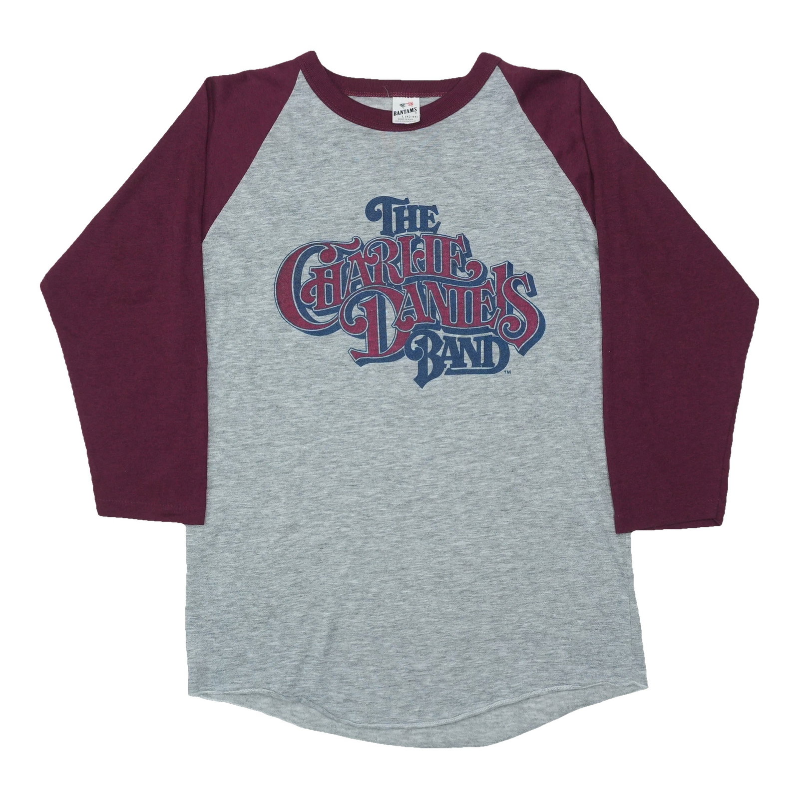 Raglan shirt world tour windows band Charlie Daniels: Raglan shirt world tour windows band Charlie Daniels Grey cotton blend Raglan shirt from The Charlie Daniels Band's 1982 Windows World Tour, featuring the iconic band logo on the front and back. This 
