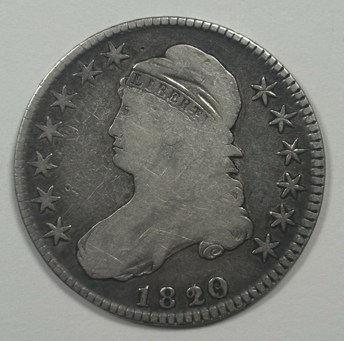 Half dollar fine details capped 19/ 1820: Half dollar fine details capped 19/ 1820 Capped Bust half dollars from the Philadelphia Mint are highly sought after for their historical significance and detailed design. The 1820 edition, in particu