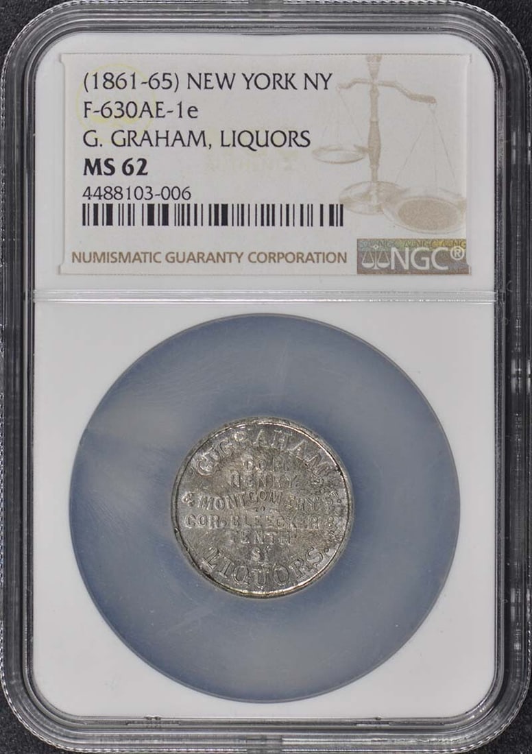 Civil War Merchant Token F-630AE-1e NY Graham Liquors 1861-65: Civil War Merchant Token F-630AE-1e NY Graham Liquors 1861-65 This Civil War Merchant Token, F-630AE-1e, bears the mark of NY Graham Liquors from 1861-65. Graded MS62 by NGC, it showcases exceptional 