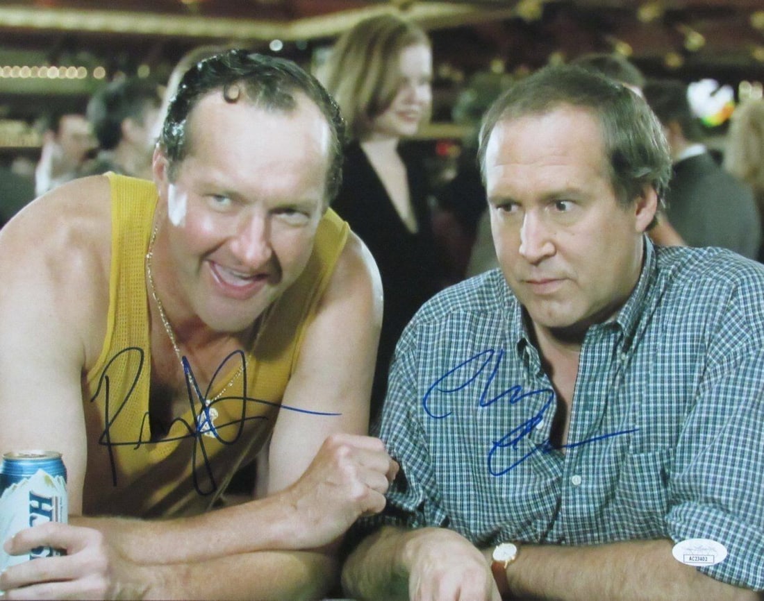 Chevy Chase/ Randy Quaid Autographed 11x14 Photo "Vegas Vacation" JSA: Chevy Chase/ Randy Quaid Autographed 11x14 Photo "Vegas Vacation" JSA Chevy Chase and Randy Quaid's iconic on-screen chemistry shines through in this 11x14 photo from the beloved comedy film "Vegas