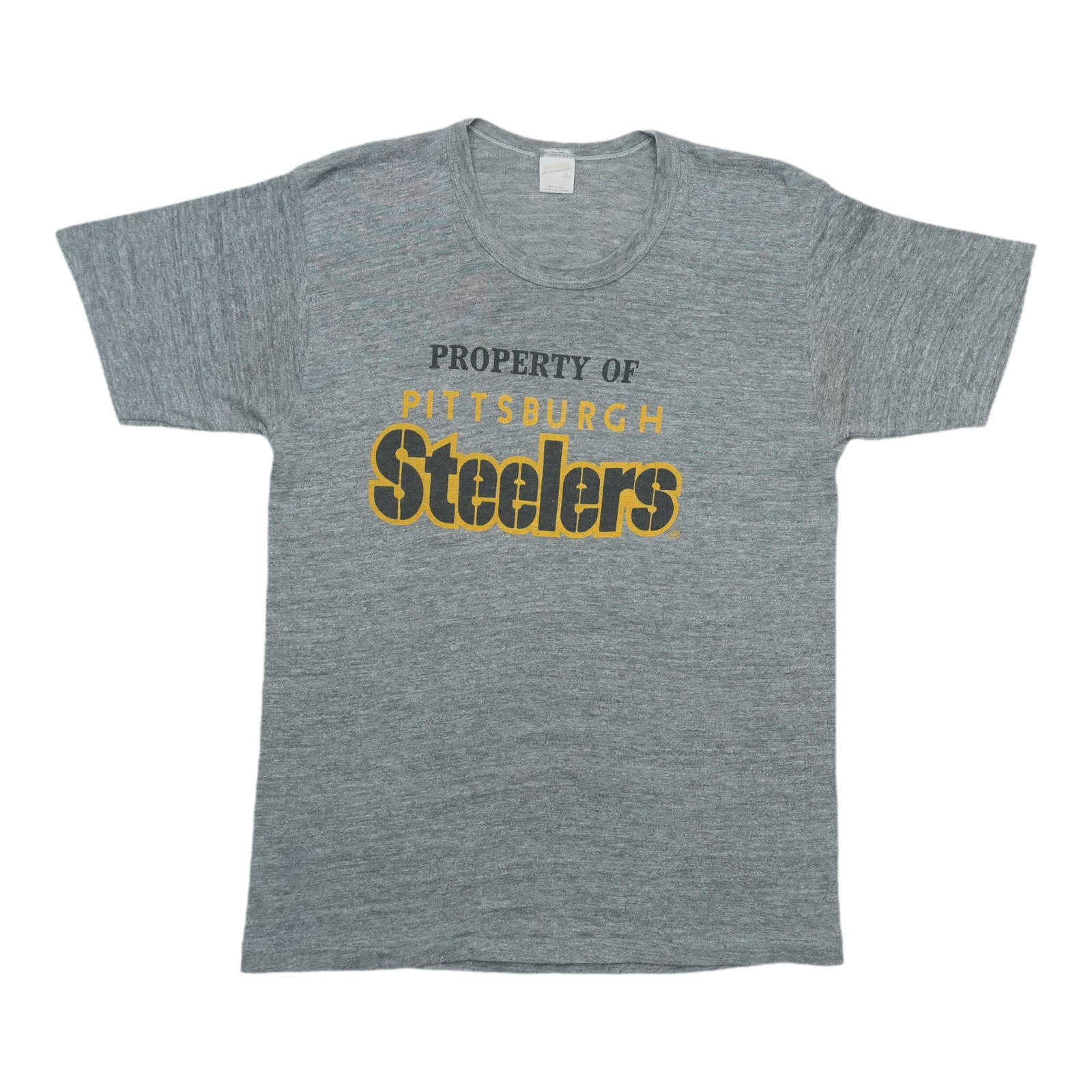 1980s Property of Pittsburgh Steelers Shirt: 1980s Property of Pittsburgh Steelers Shirt Grey Property of Pittsburgh Steelers Shirt from the 1980s, featuring an iconic design with discoloration on the front. Measuring 18" pit to pit and 26" coll
