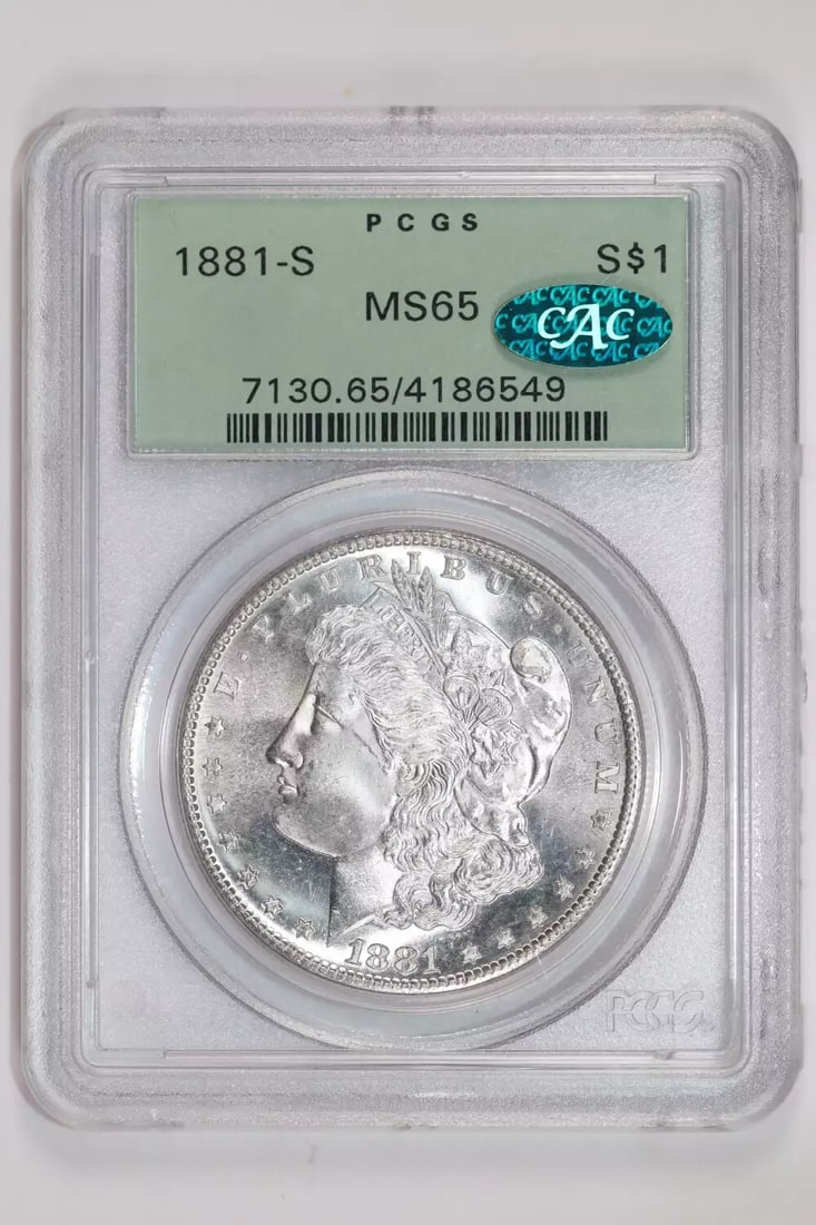 1881-S MORGAN DOLLAR PCGS MS65 CAC OGH - VERY PQ LOOKS NICER: 1881-S MORGAN DOLLAR PCGS MS65 CAC OGH - VERY PQ LOOKS NICER The 1881-S Morgan Dollar, graded MS65 by PCGS and CAC, boasts exceptional condition with a beautiful, very pale cameo look. This stunning c