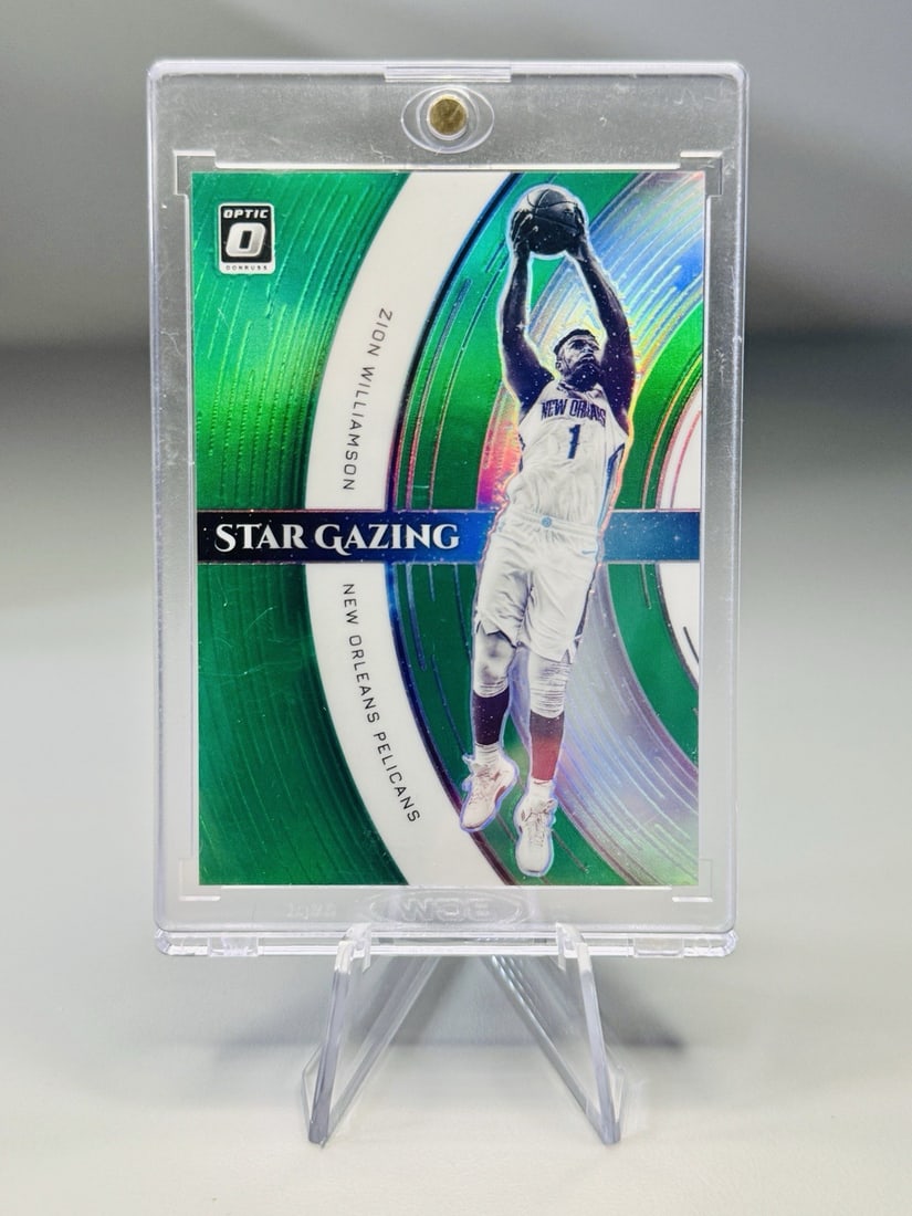 STAR GAZING OPTIC WILLIAMSON GREEN PANINI DONRUSS ZION #4 1/ 5: STAR GAZING OPTIC WILLIAMSON GREEN PANINI DONRUSS ZION #4 1/ 5 Zion Williamson's 2021 Panini Donruss Optic card features his impressive #4/5, showcasing the New Orleans Pelicans star in a striking gre