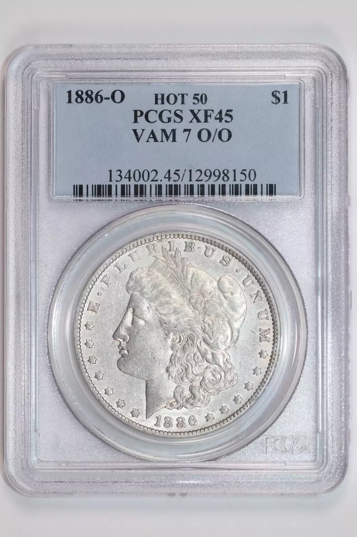 Morgan Dollar 1886 Hot Vam 7 pcgs xf45: Morgan Dollar 1886 Hot Vam 7 pcgs xf45 The 1886 Morgan Dollar, graded XF 45 by PCGS, showcases its well-worn circulated condition. This coin bears the mark of its age and usage, with a rich history to