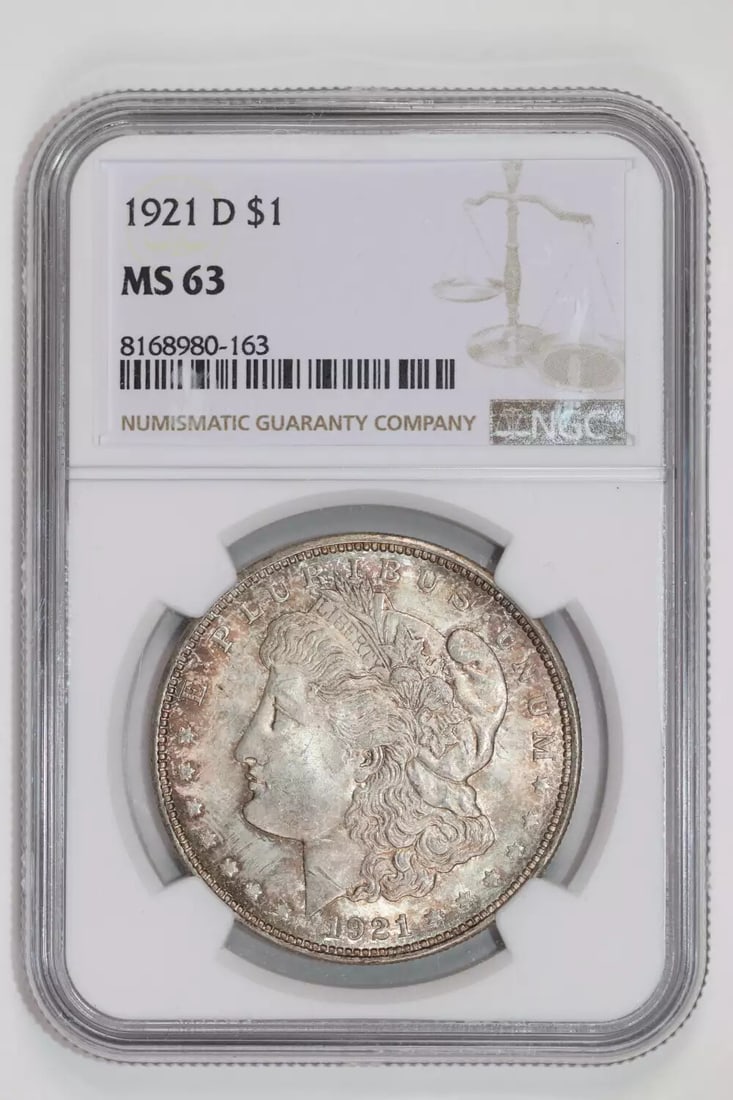 1921-D MORGAN DOLLAR NGC MS63: 1921-D MORGAN DOLLAR NGC MS63 The 1921-D Morgan Dollar, certified MS63 by the Numismatic Guaranty Corporation (NGC), boasts an impressive silver composition and a high grade of 63. This uncirculated c