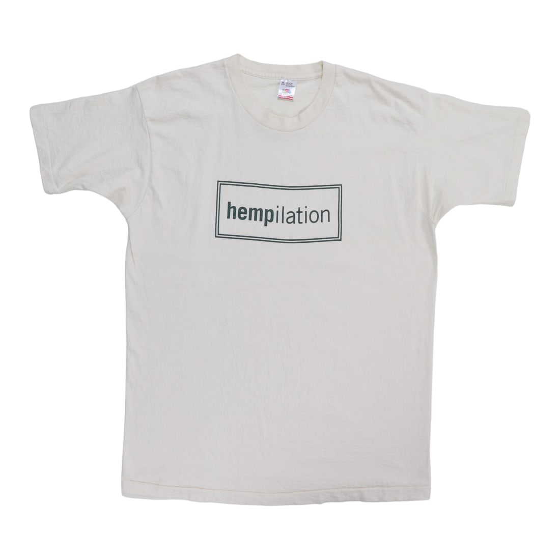 1990s Hempilation NORML Shirt: 1990s Hempilation NORML Shirt Tan 100% Cotton Hempilation NORML Shirt from the 1990s, featuring front and back graphics. This vintage shirt is in excellent condition, with no holes or discoloration on