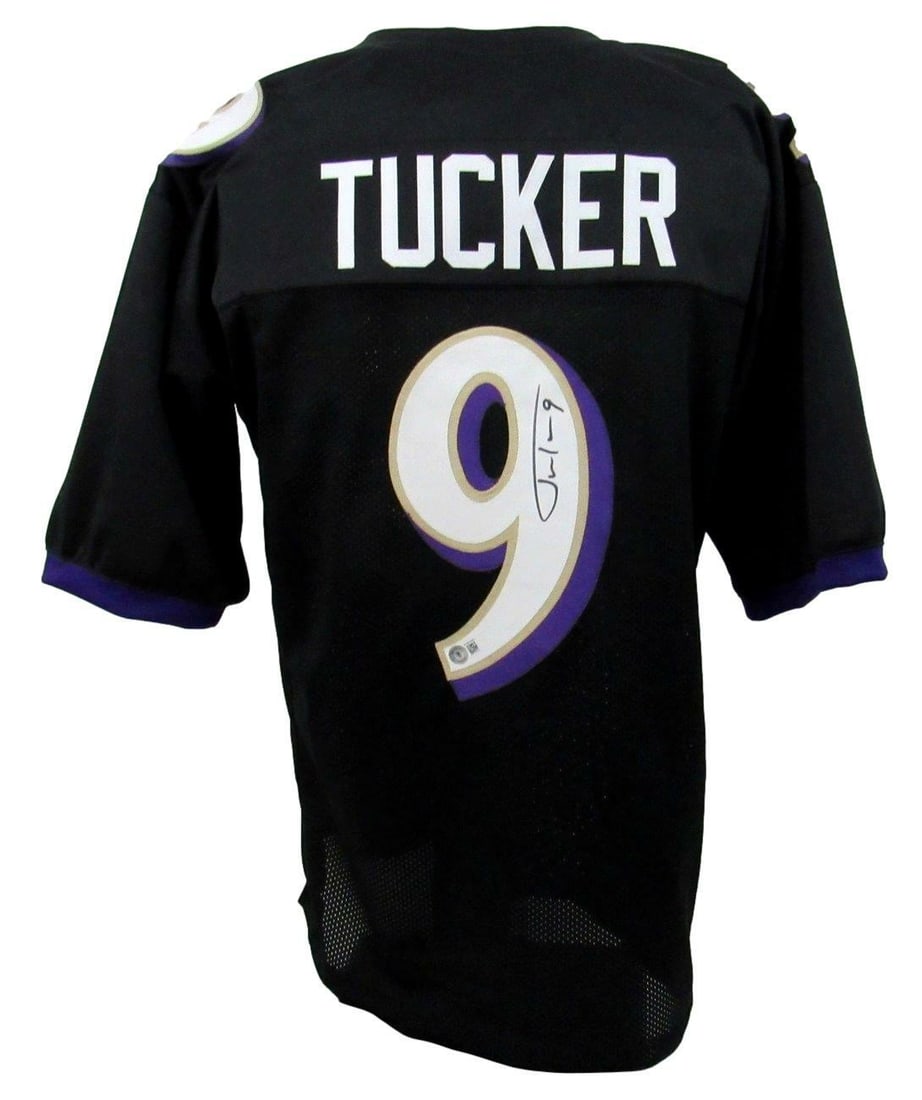 Justin Tucker Signed/ Autographed Ravens Black Custom Jersey Beckett 164215: Justin Tucker Signed/ Autographed Ravens Black Custom Jersey Beckett 164215 Justin Tucker's signature shines on this custom Baltimore Ravens jersey, bearing the mark of Beckett Authentication. The NFL