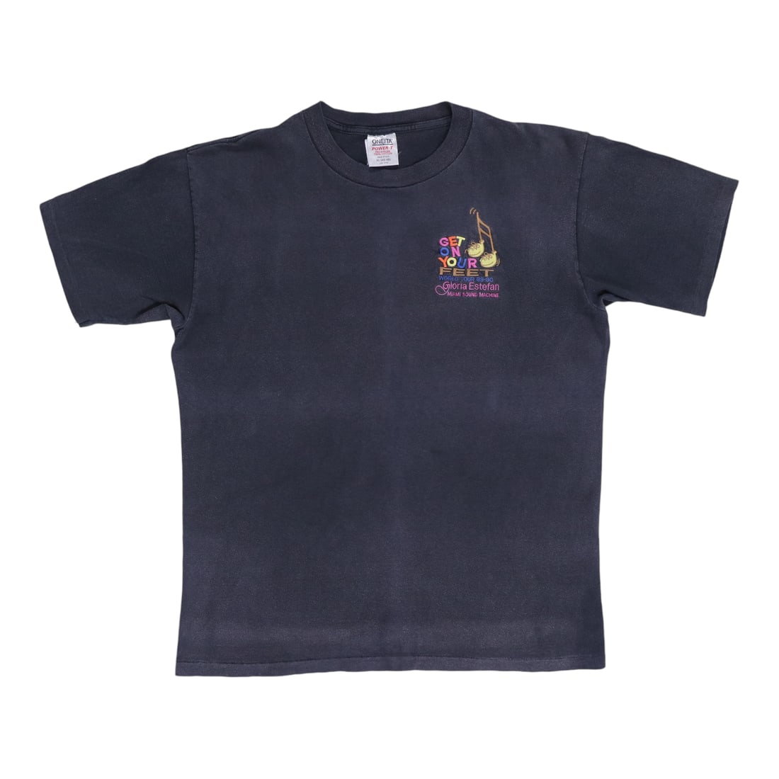 1989 Gloria Estefan Get On Your Feet Tour Shirt: 1989 Gloria Estefan Get On Your Feet Tour Shirt Extra Large 1989 Gloria Estefan Get On Your Feet Tour Shirt in worn condition, featuring black cotton material and no back graphics. The shirt measures 