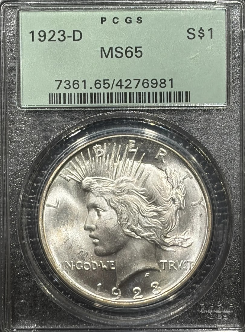 1923-D PEACE DOLLAR PCGS MS65 OGH: 1923-D PEACE DOLLAR PCGS MS65 OGH The 1923-D Peace Dollar, graded MS65 by PCGS, boasts exceptional condition with outstanding mint state quality. This stunning coin features a silver composition and b
