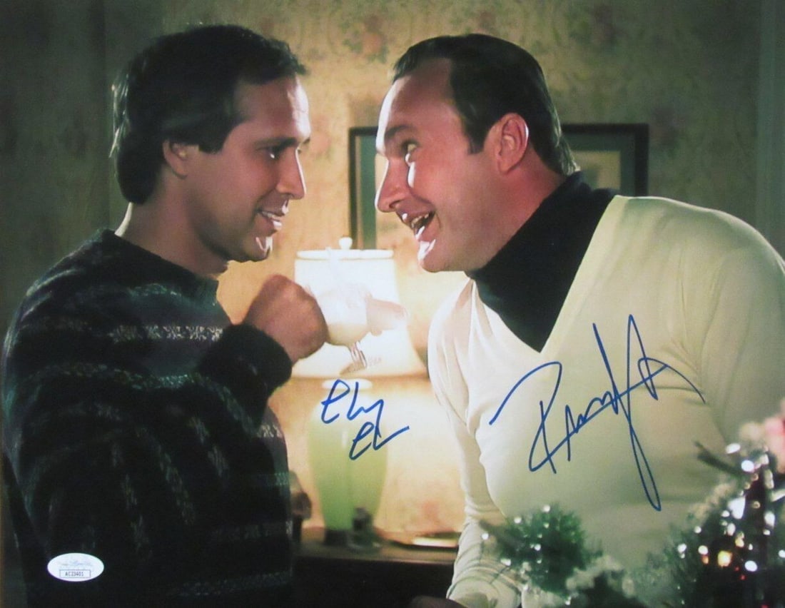 Chevy Chase Autographed Christmas Vacation Photo 11x14 JSA 168310: Chevy Chase Autographed Christmas Vacation Photo 11x14 JSA 168310 Chevy Chase's iconic grin from the holiday classic Christmas Vacation shines brightly in this 11x14 photo, signed by the beloved actor