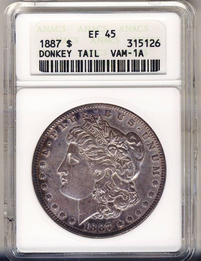 AVC1082- 1887 VAM-1A "DONKEY TAIL" TOP 100 MORGAN DOLLAR ANACS XF45: AVC1082- 1887 VAM-1A "DONKEY TAIL" TOP 100 MORGAN DOLLAR ANACS XF45 The AVC1082-1887 VAM-1A "DONKEY TAIL" Top 100 Morgan Dollar features a distinctive "donkey tail" design on the reverse, a notable ch