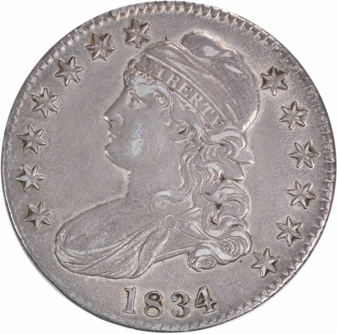 1834 Bust Half Dollar EF Uncertified: 1834 Bust Half Dollar EF Uncertified The 1834 Bust Half Dollar EF Uncertified boasts an impressive history, bearing the mark of John Reich's design and crafted from a rare blend of 89.2% silver and 10