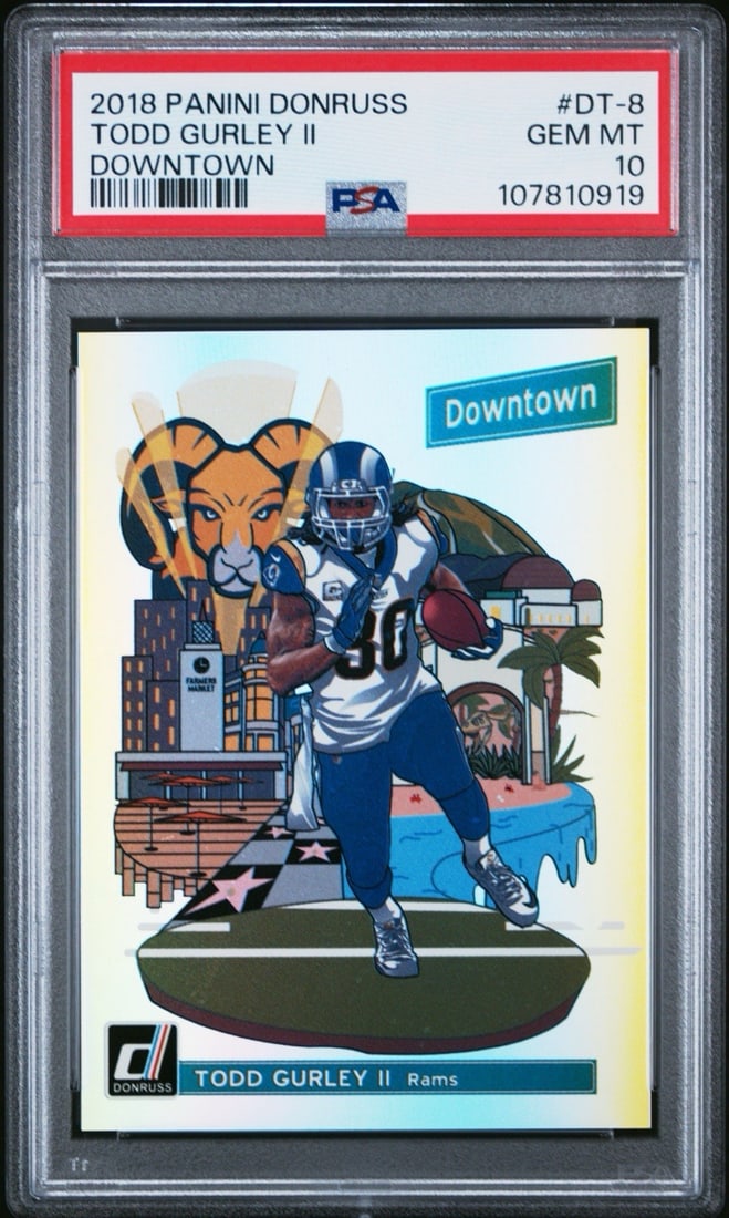 2018 PANINI DONRUSS TODD GURLEY II DOWNTOWN #DT-8 PSA 10: 2018 PANINI DONRUSS TODD GURLEY II DOWNTOWN #DT-8 PSA 10 PSA 10 graded, the 2018 Panini Donruss Downtown #DT-8 card features Todd Gurley II in a unique downtown setting. This high-end autograph card