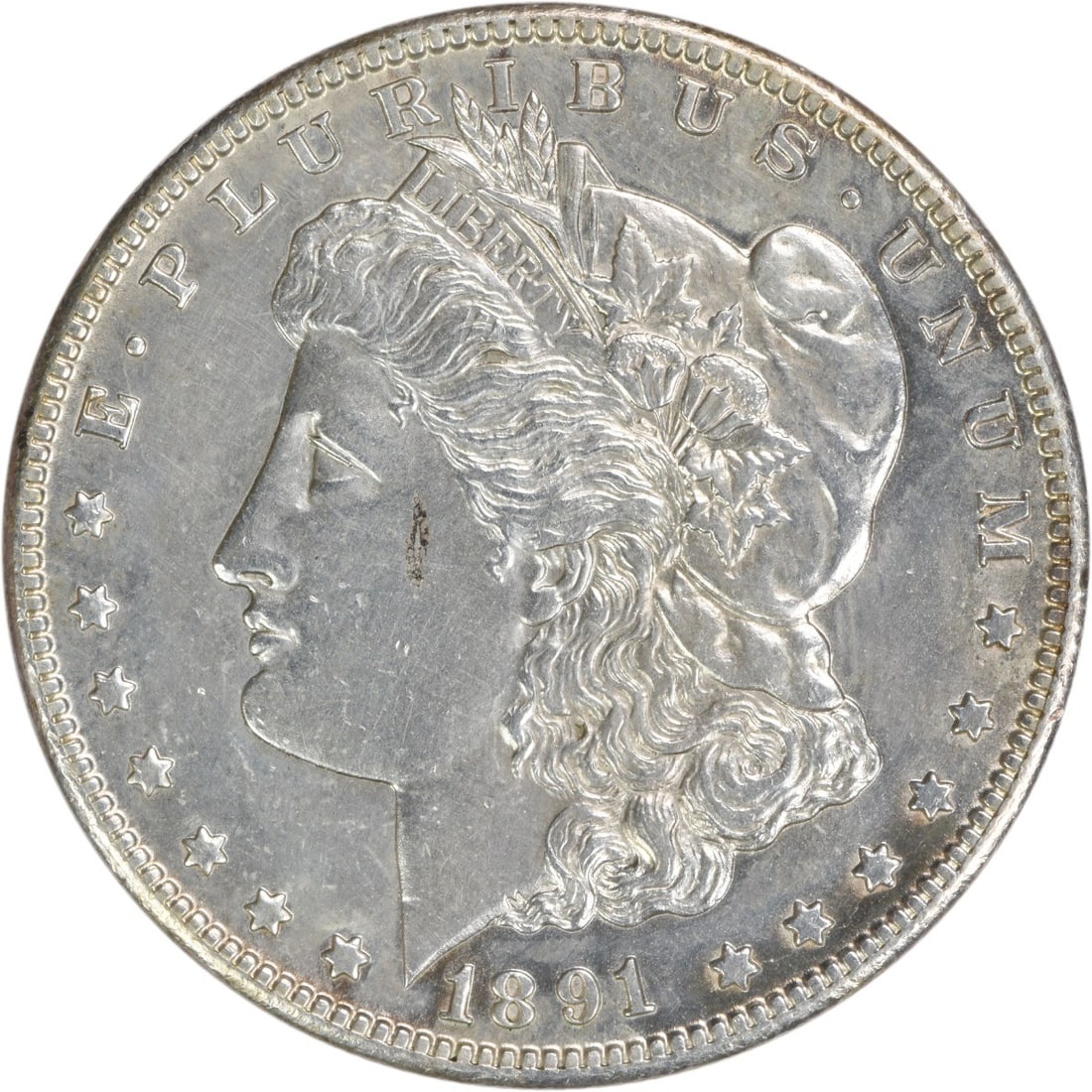 Morgan Silver Dollar 1891 CC AU Uncertified: Morgan Silver Dollar 1891 CC AU Uncertified The Morgan Silver Dollar 1891 CC features a unique combination of 90% silver and 10% copper composition, making it an attractive option for those