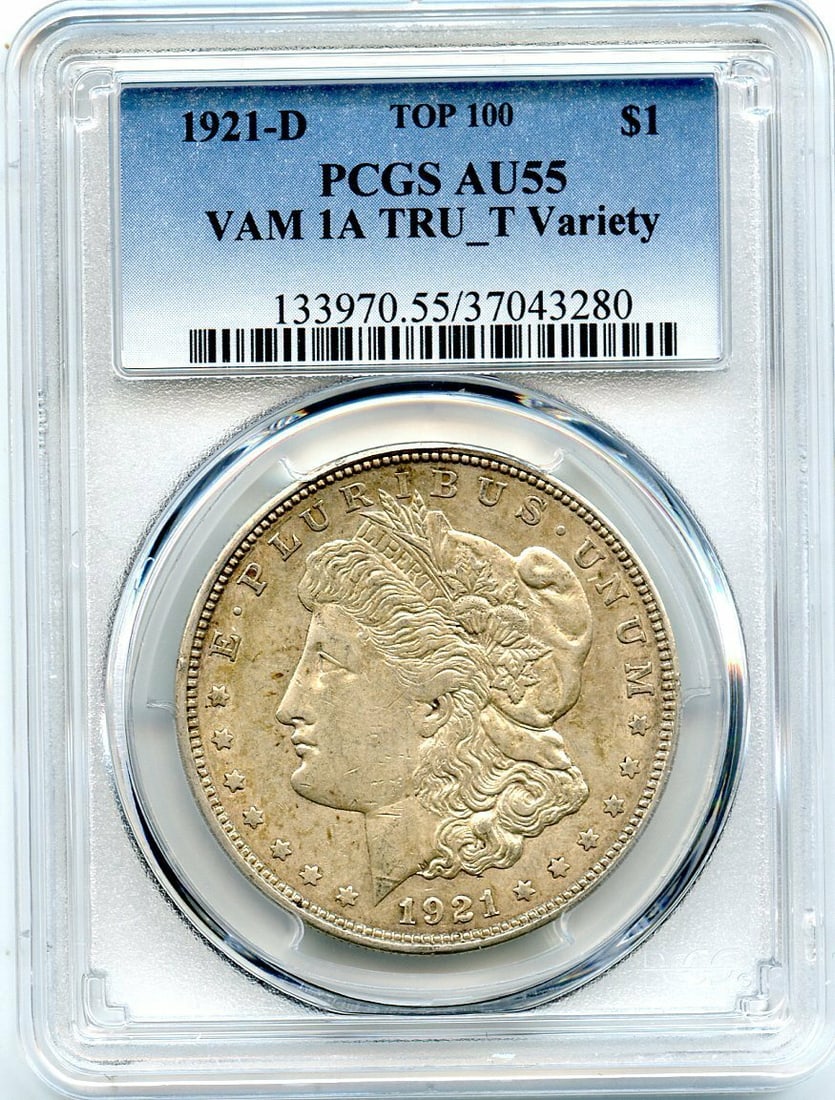 MORGAN DOLLAR TOP TRU_T 1921 C12491- VAM-1A PCGS AU55: MORGAN DOLLAR TOP TRU_T 1921 C12491- VAM-1A PCGS AU55 The 1921 Morgan Dollar, graded AU55 by PCGS, boasts its original circulated condition and bears the mark of the Philadelphia Mint. This coin's VAM