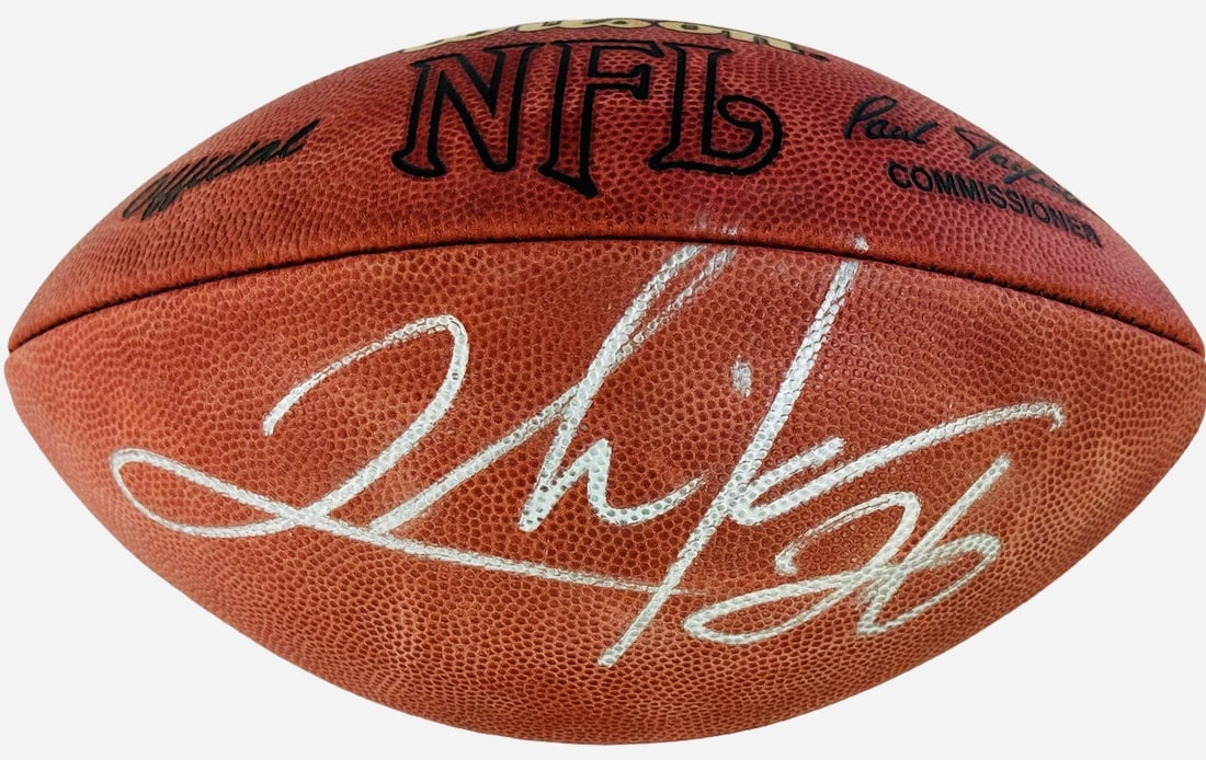 Clinton Portis Autographed Official NFL Football (JSA): Clinton Portis Autographed Official NFL Football (JSA) Clinton Portis Autographed Official NFL Football (JSA) - This official Paul Tagliabue football has been signed by Clinton Portis in silver sharpi