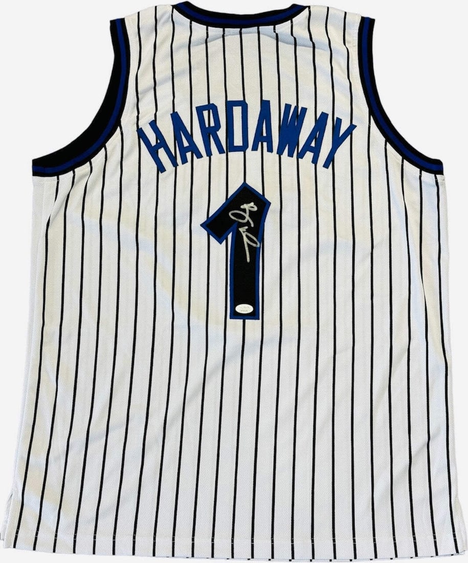 Anfernee Hardaway Autographed Magic Custom Jersey (JSA): Anfernee Hardaway Autographed Magic Custom Jersey (JSA) Authernee Hardaway's game-worn jersey bears his signature in silver sharpie on the back, adding a unique touch to this rare collectible. The Jam