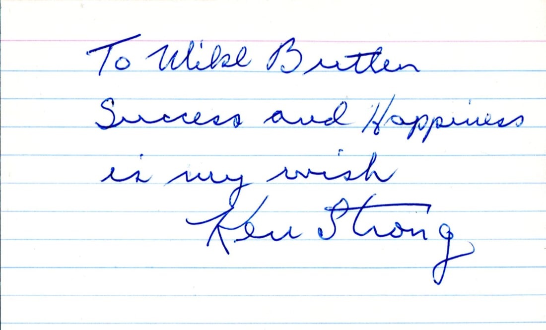 Ken Strong Autographed 3x5 Card: Ken Strong Autographed 3x5 Card Signed by Ken Strong in blue pen, this 3x5 card bears the artist's mark. The item comes with authentication from , providing assurance of its legitimacy. A unique piece
