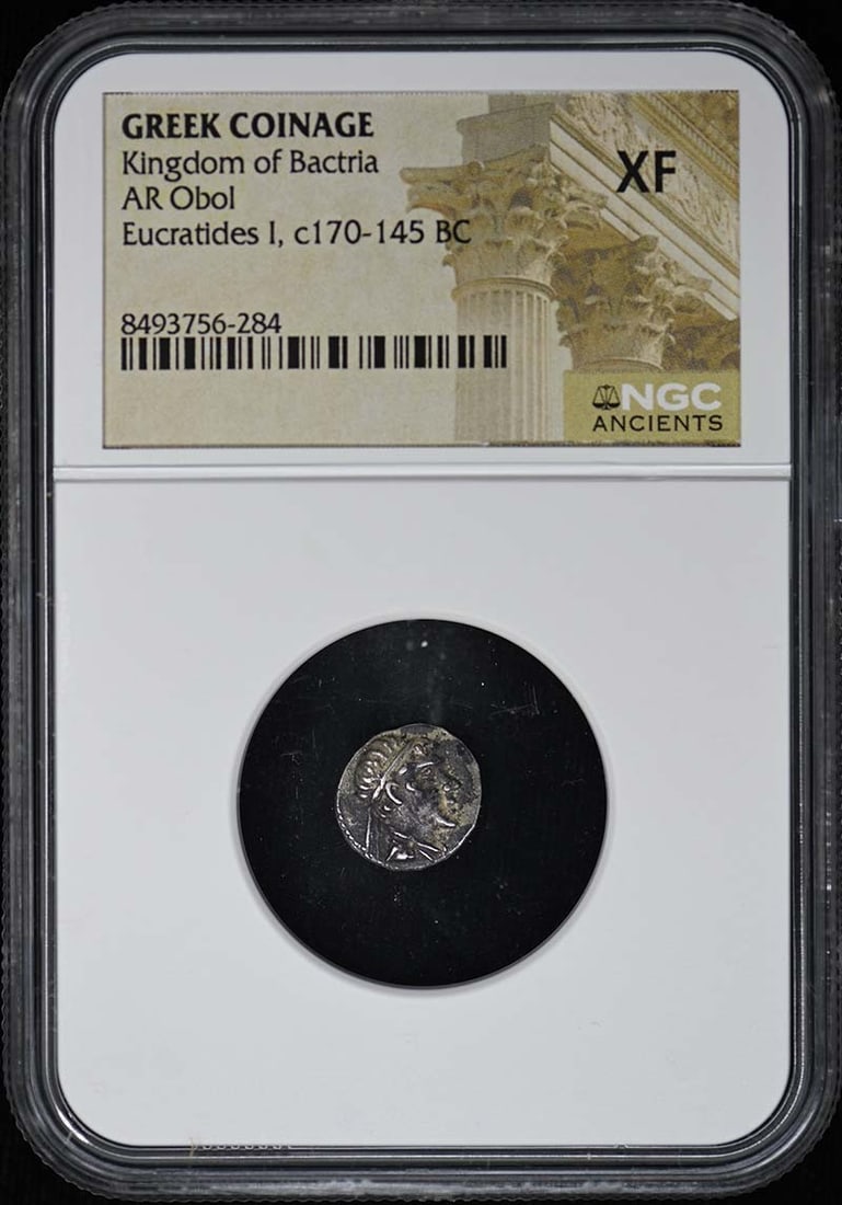 Kingdom of Bactria-GREEK COINAGE GREEK COINAGE AR Obol NGC XF: Kingdom of Bactria-GREEK COINAGE GREEK COINAGE AR Obol NGC XF NGC XF graded Greek Obol coinage, bearing the mark of the National Coin Grading Service. This ancient coin boasts exceptional condition an