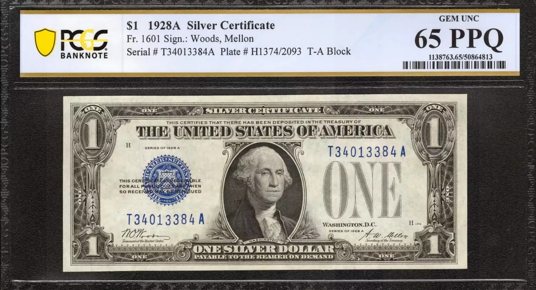 1928 A $1 SILVER CERTIFICATE FR.1601 WOODS MELLON T-A BLOCK PCGS 65 PPQ (384A): 1928 A $1 SILVER CERTIFICATE FR.1601 WOODS MELLON T-A BLOCK PCGS 65 PPQ (384A) The 1928 A $1 SILVER CERTIFICATE FR.1601 WOODS MELLON T-A BLOCK PCGS 65 PPQ features a high-grade circulated condition, c