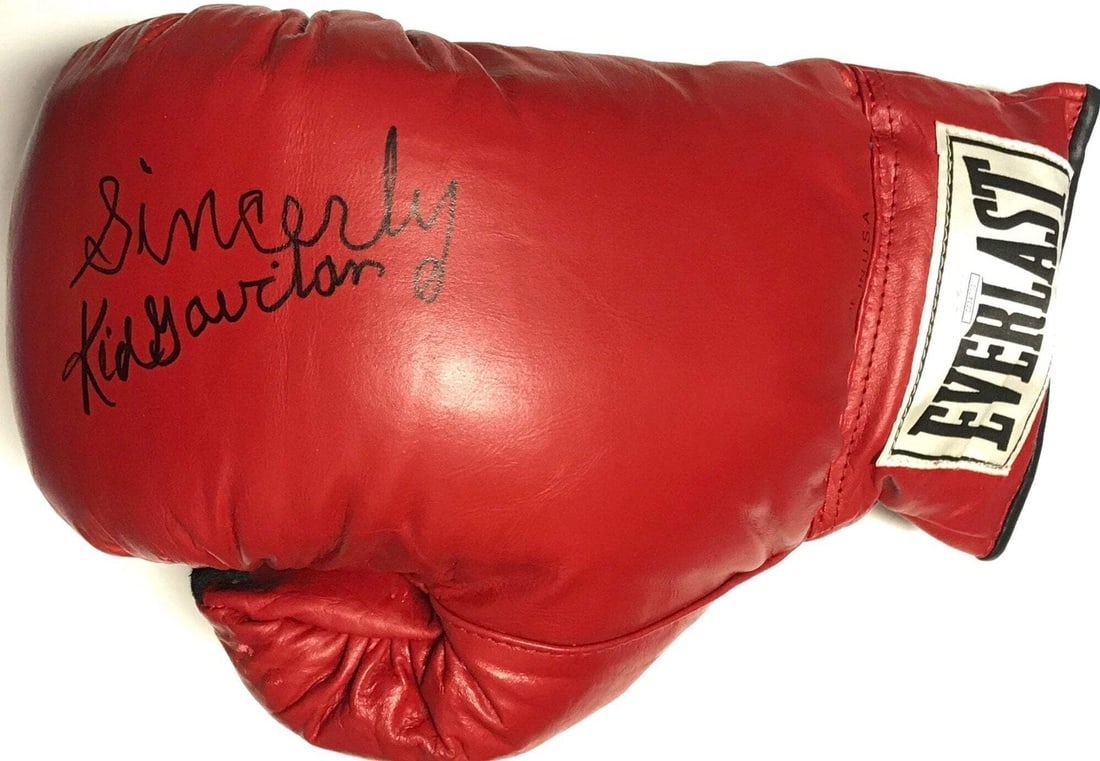 Autographed Red Glove Right Everlast Boxing Gaviln Kid: Autographed Red Glove Right Everlast Boxing Gaviln Kid The Autographed Red Glove Right Everlast Boxing Gaviln Kid boasts a striking black sharpie signature across the front, bearing the mark of James 