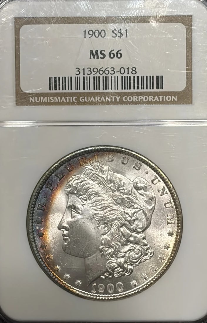 Morgan dollar 1900 MS66 NGC: Morgan dollar 1900 MS66 NGC The 1900 Morgan dollar, graded MS66 by the Numismatic Guaranty Corporation (NGC), boasts exceptional silver content and a high level of preservation. This coin bears the ce