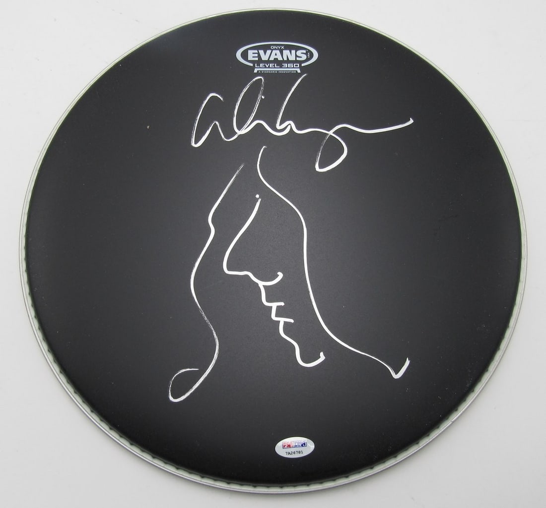 Alice Cooper Singer Signed/ Auto Drum Head w/ Self Portrait Sketch PSA/ DNA 200969: Alice Cooper Singer Signed/ Auto Drum Head w/ Self Portrait Sketch PSA/ DNA 200969 Signed by Alice Cooper, this auto drum head features a self-portrait sketch and comes with a PSA/ DNA report for veri