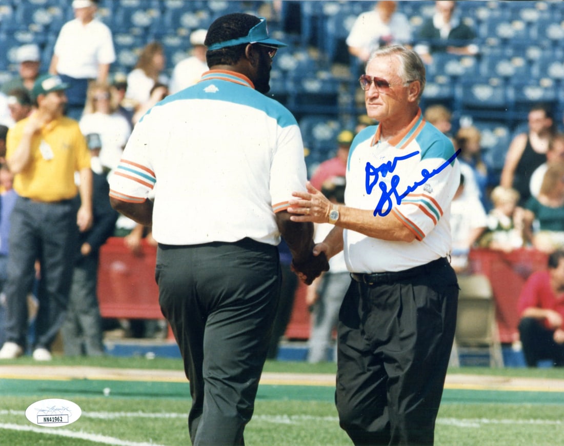 Shula Autographed 8x10 Photo by JSA: Shula Autographed 8x10 Photo by JSA Item Specifics: Brand: James Spence Authentication (JSA) Don Shula Autographed 8x10 Photo Signed in blue sharpie across the front of the photo Authenticity is provi