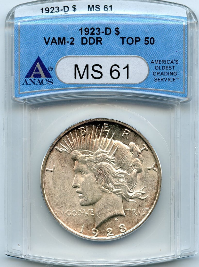 C5266- 1923-D VAM-2 DOUBLED DIE REVERSE TOP 50 PEACE DOLLAR ANACS MS61: C5266- 1923-D VAM-2 DOUBLED DIE REVERSE TOP 50 PEACE DOLLAR ANACS MS61 The 1923-D VAM-2 Doubled Die Reverse Top 50 Peace Dollar features a distinctive error, where the reverse design appears doubled d