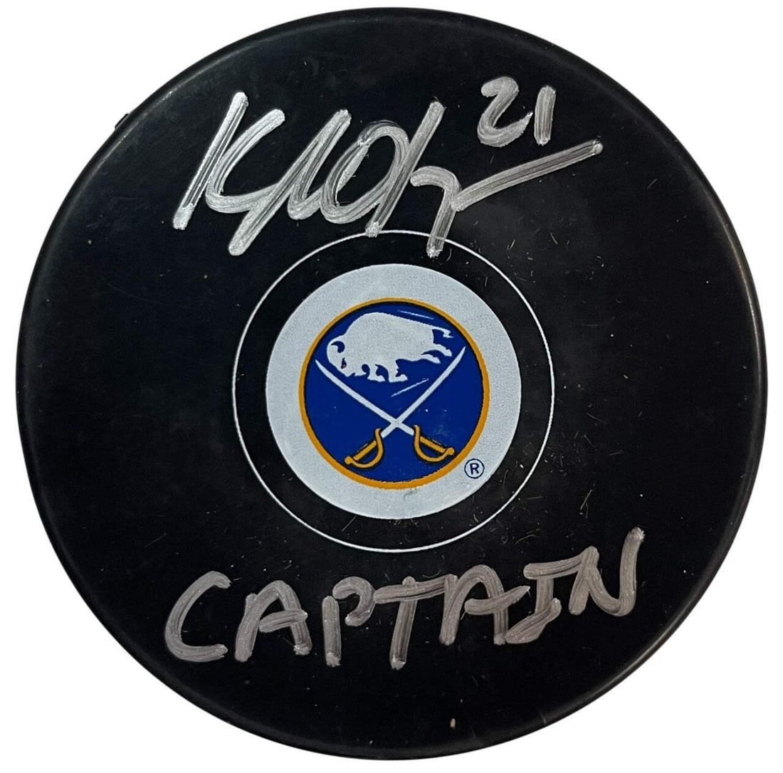 Kyle Okposo Autographed "Captain" Buffalo Sabres Puck (Beckett Witness) (1 of 2)